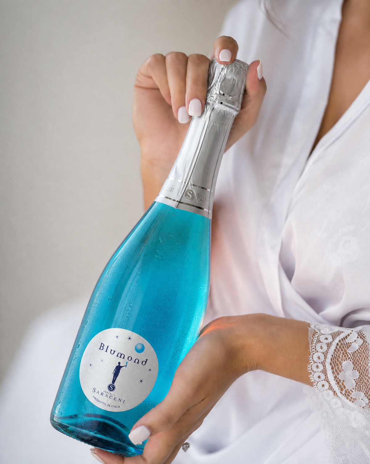 Blumond blue sparkling wine styled at a wedding, lifestyle shot