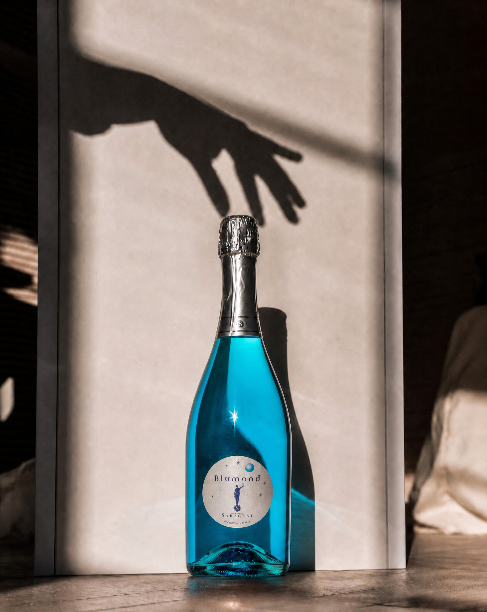 Blumond Blue Bubbly — bright blue Italian sparkling sweet wine, 750ml, Saraceni Wines (editorial shot)