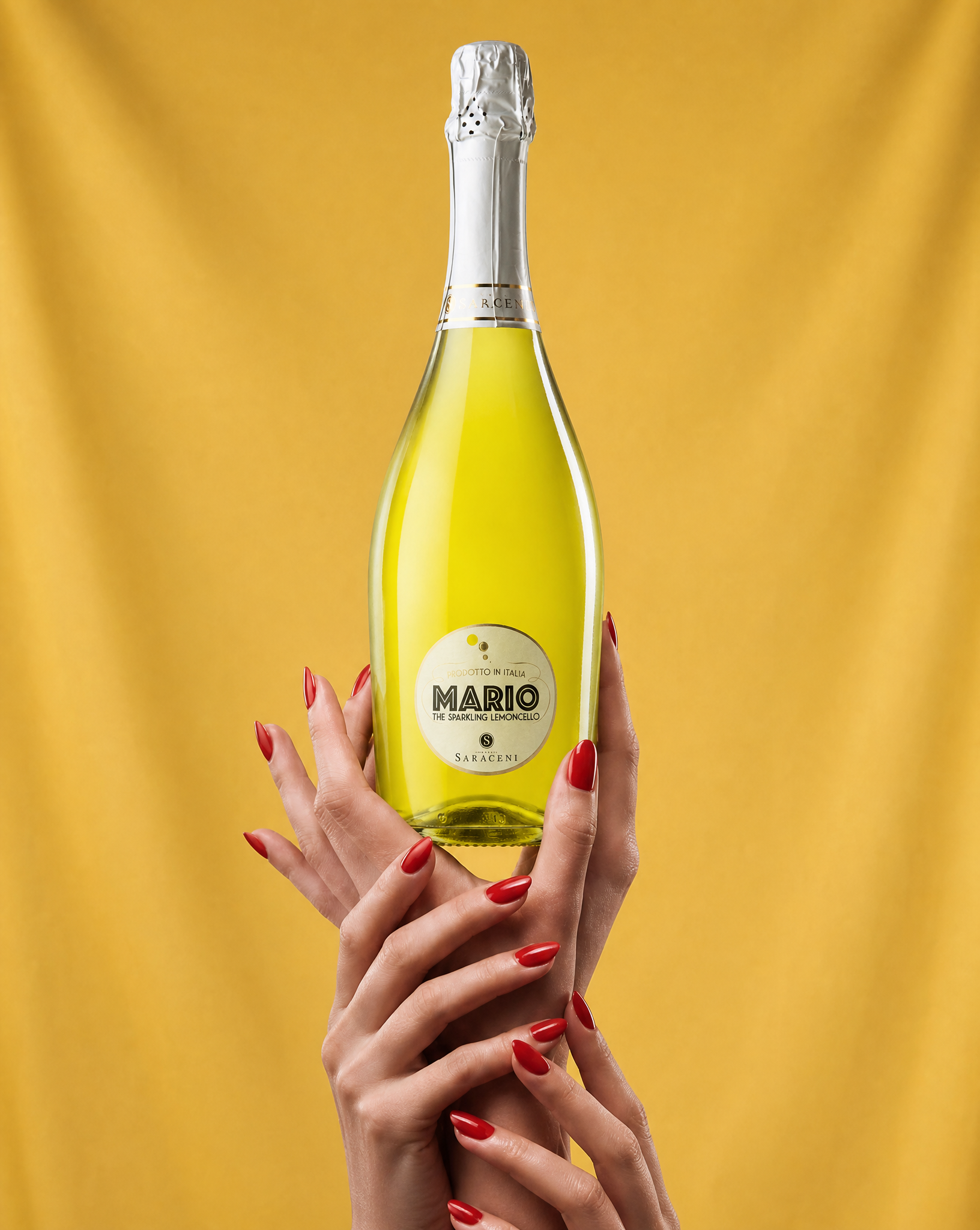 Mario Lemoncello Spritz — bright yellow sparkling sweet limoncello wine, 750ml, Saraceni Wines (lifestyle image)